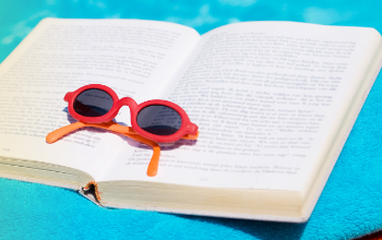 sunglasses on book